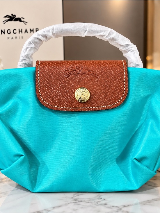 Longchamp Handbags - SMALL Longchamp Turquoise Nylon Tote with Brown Leather Trim